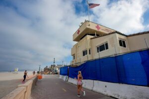 Construction for the temporary lifeguard tower has begun just north of the existing tower in Mission Beach on Wednesday in San Diego. In place during the construction is a detour toward a platform boardwalk that goes around the construction. Nelvin C. Cepeda / U-T